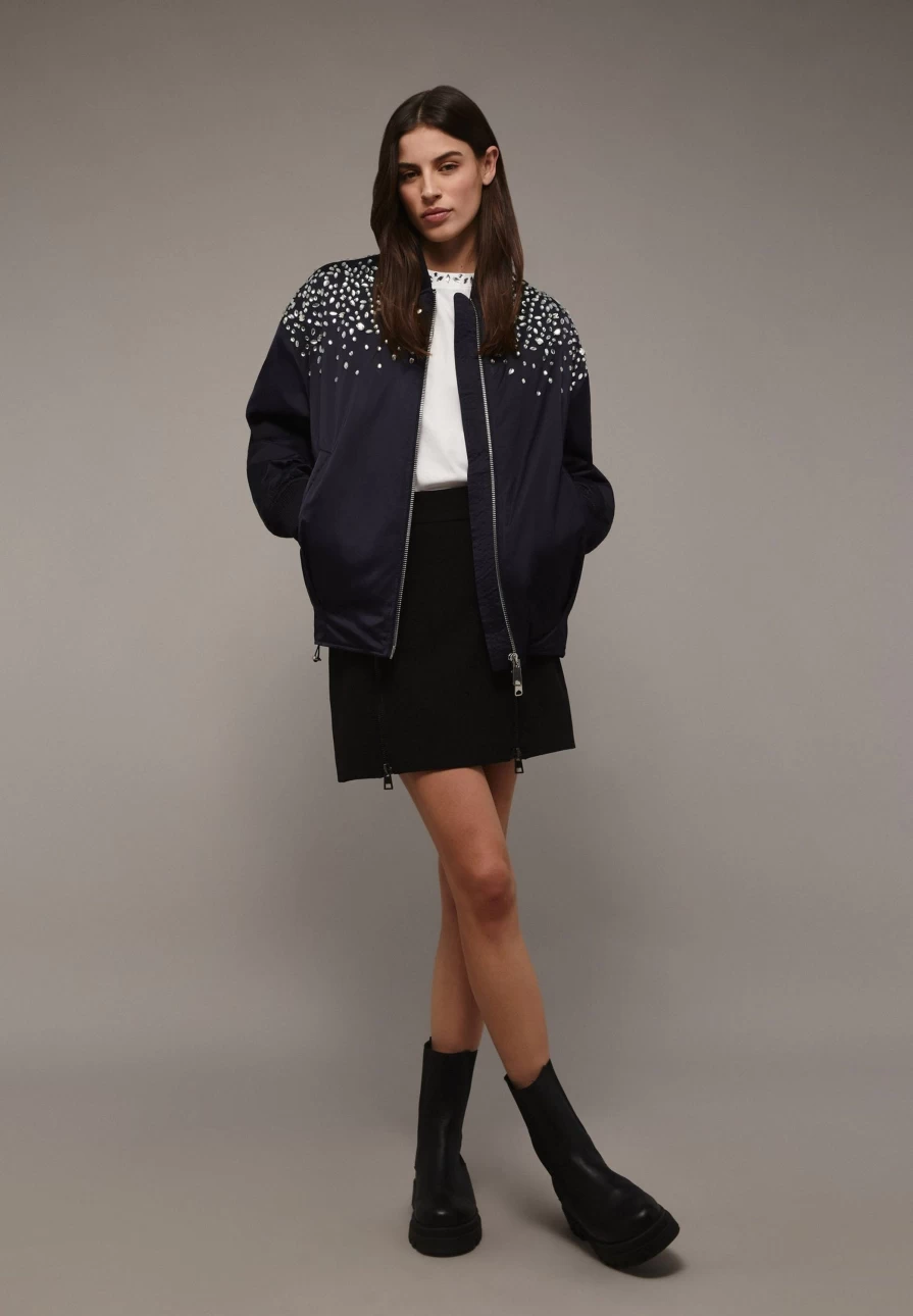 "ScalpersCompany Women's Black Mini Skirt with Stylish Zip Detail"
