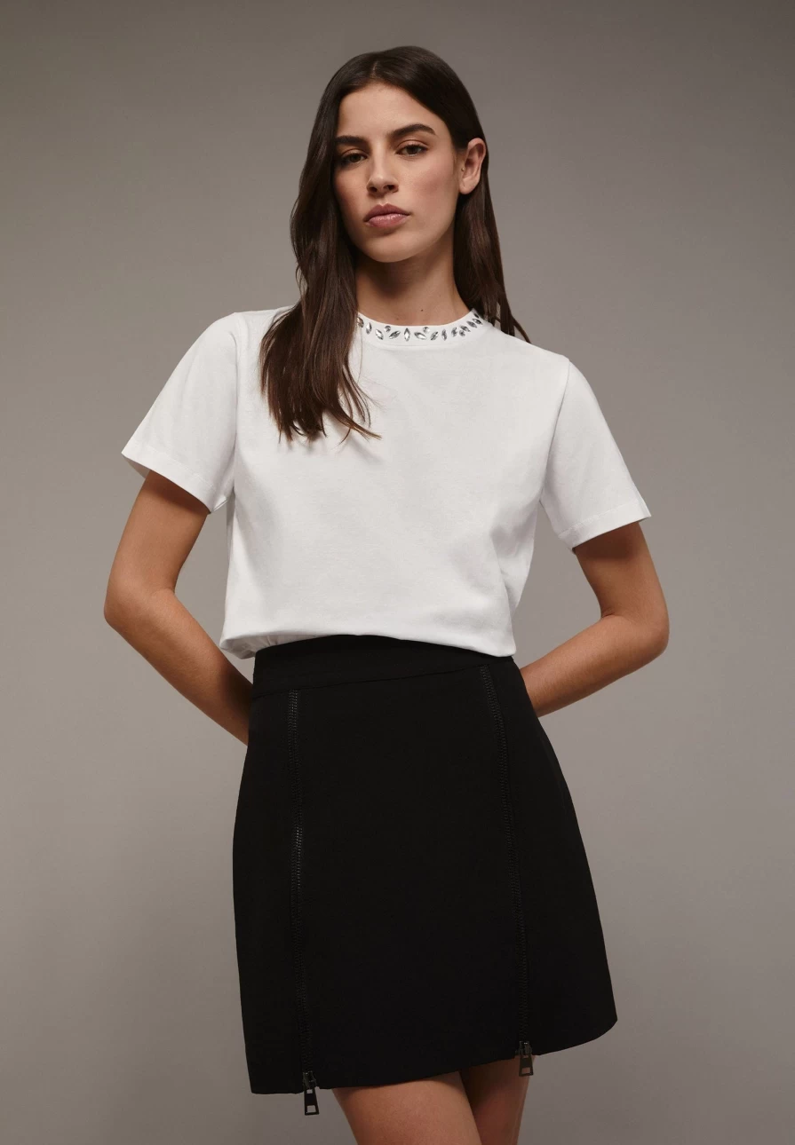 "ScalpersCompany Women's Black Mini Skirt with Stylish Zip Detail"