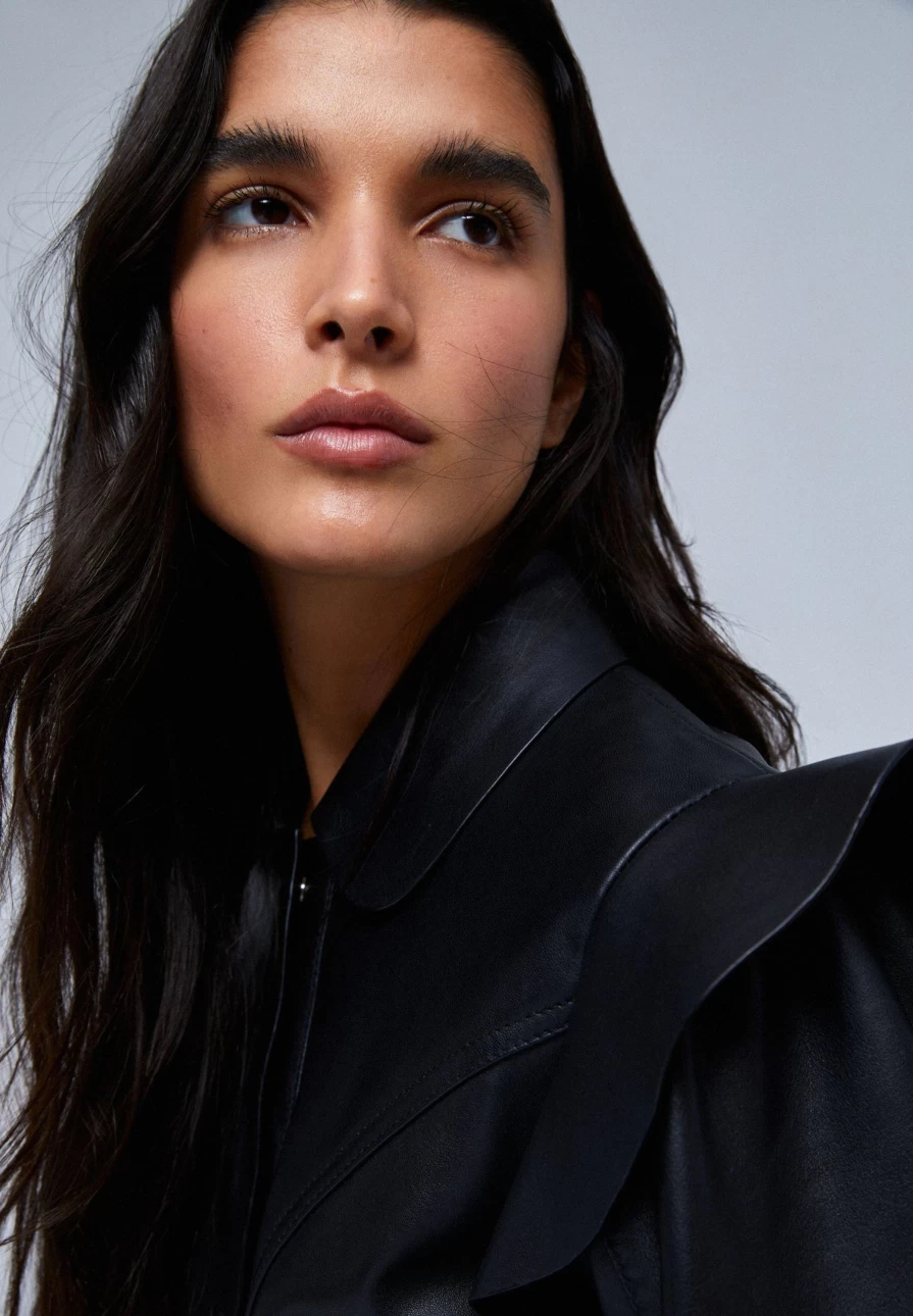 "ScalpersCompany Women's Stylish Leather Jacket with Shoulder Frill Detail"
