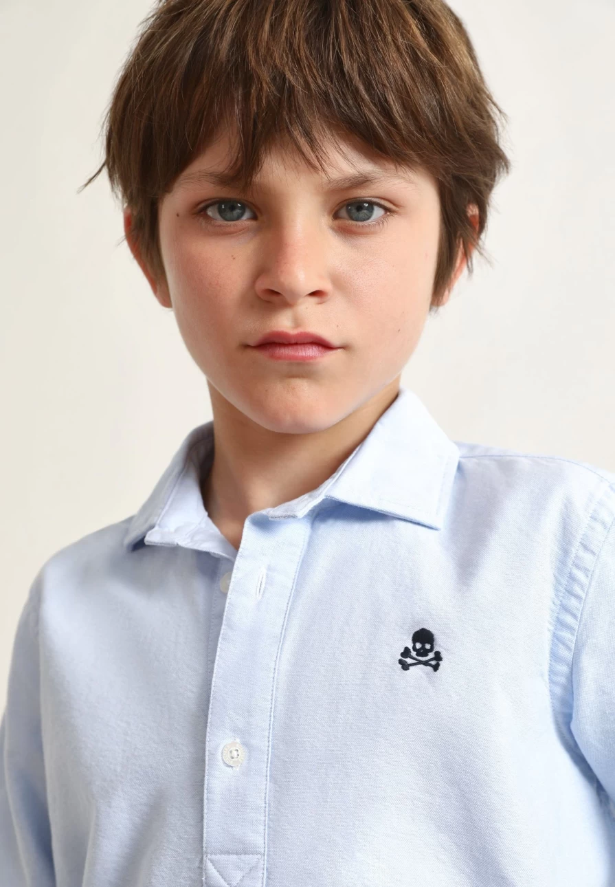 "ScalpersCompany Kids Sky Blue Polo Neck Shirt with Contrast Skull Print"