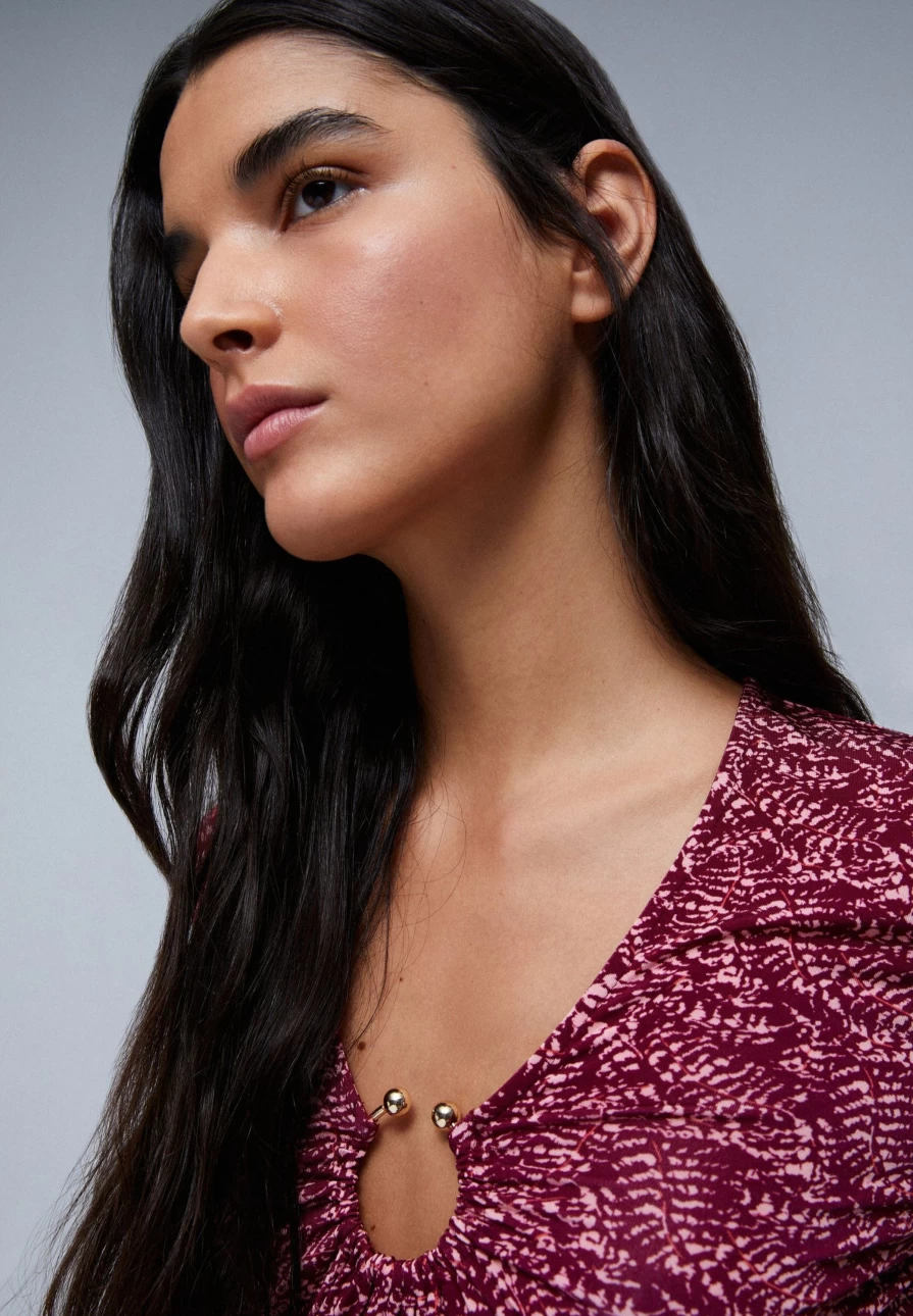 "ScalpersCompany Women's Coral Top with Stylish Neckline Detail"