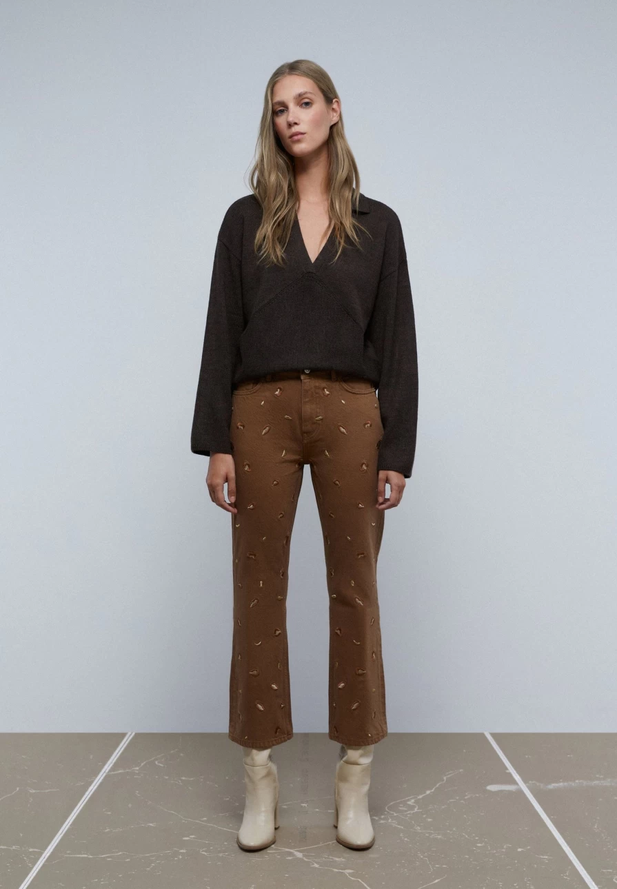 "ScalpersCompany Women's Camel Flared Jeans with Embroidered Details"