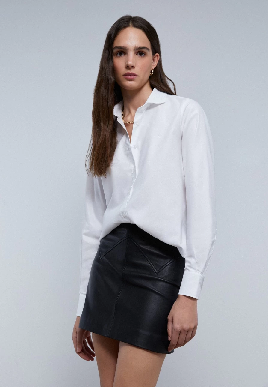 "ScalpersCompany Women's Stylish Leather Belt Skirt – Fashionable & High-Quality"