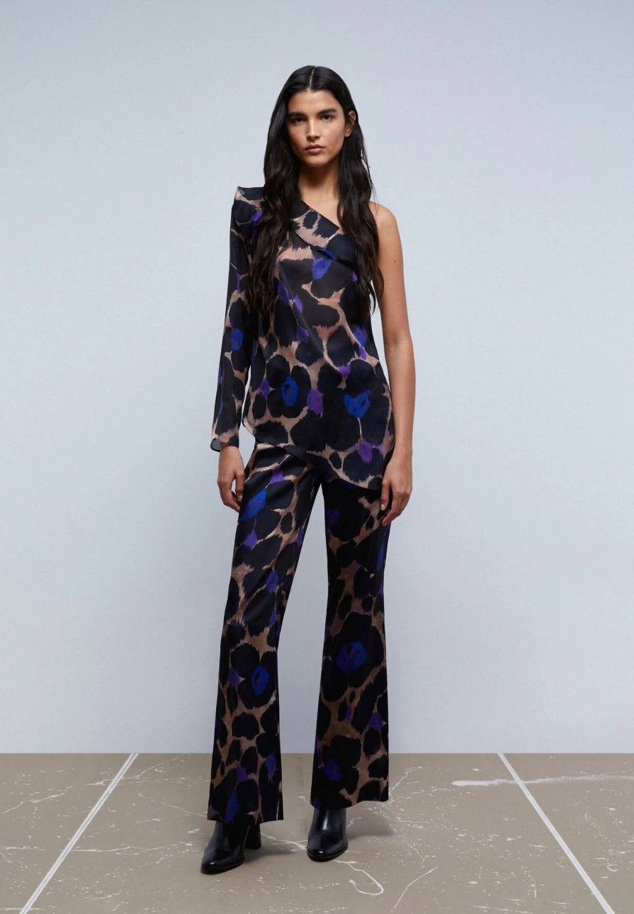 "ScalpersCompany Women's Animal Print Trousers with Unique Waist Detail Design"