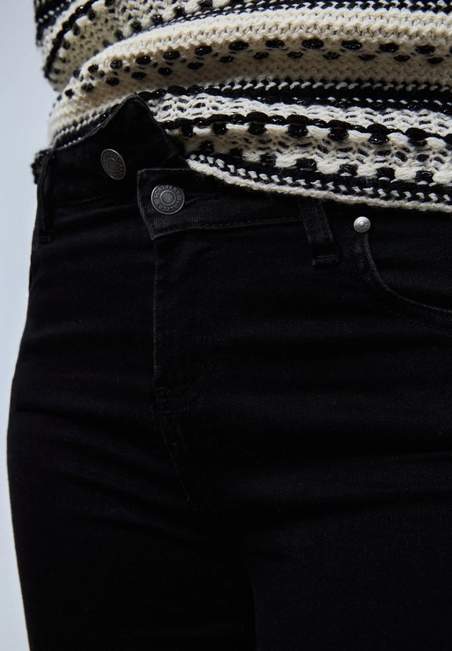 "Scalperscompany Women's Black Skinny Jeans with Button Details"