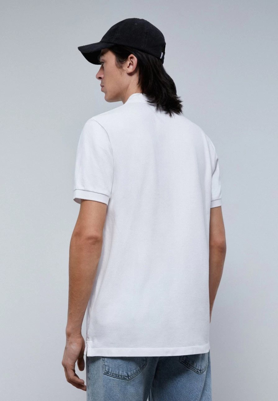 "ScalpersCompany Men's White Basic Polo Shirt with Contrast Skull Design"